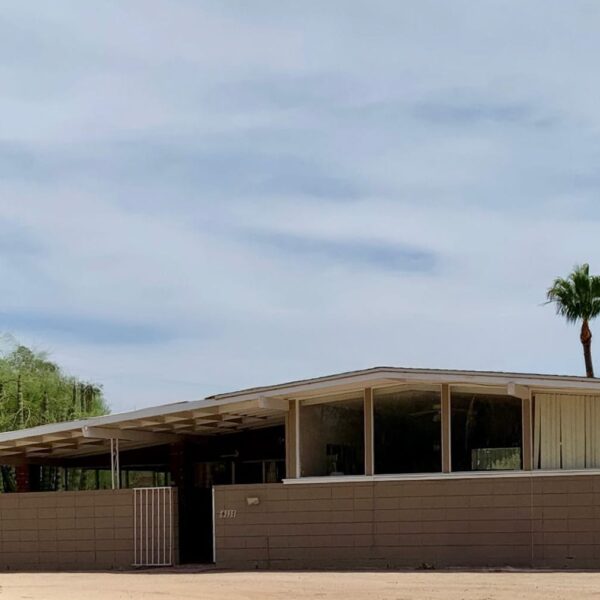 Ralph Haver mid-century modern home in Marion Estates Phoenix with low roofline, clerestory windows, cactus landscaping, palm trees, and desert modern design.