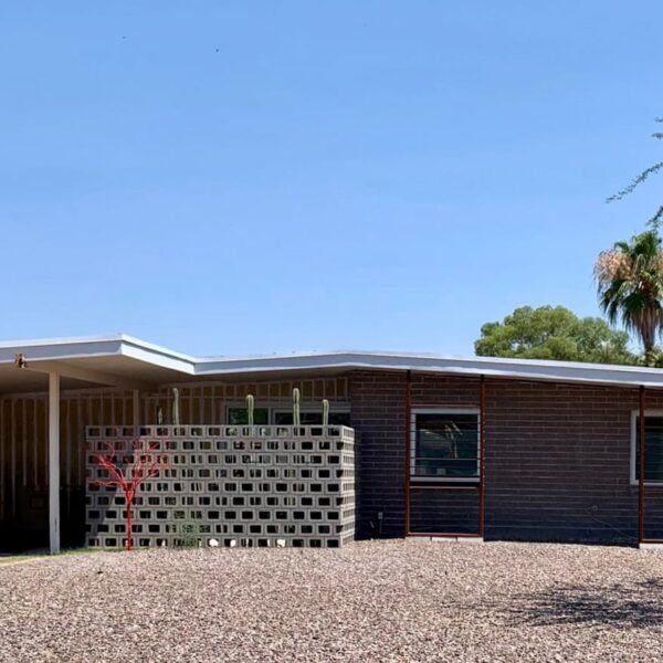 Al Beadle mid-century modern home in Paradise Gardens Phoenix with breeze block, carport, low roofline, gravel landscape, and desert modern design.