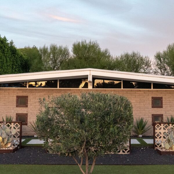 Ralph Haver mid-century modern home in Phoenix with a low roofline, breeze block walls, and desert landscaping.